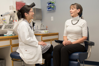 Li Wei Lin Treating a Patient